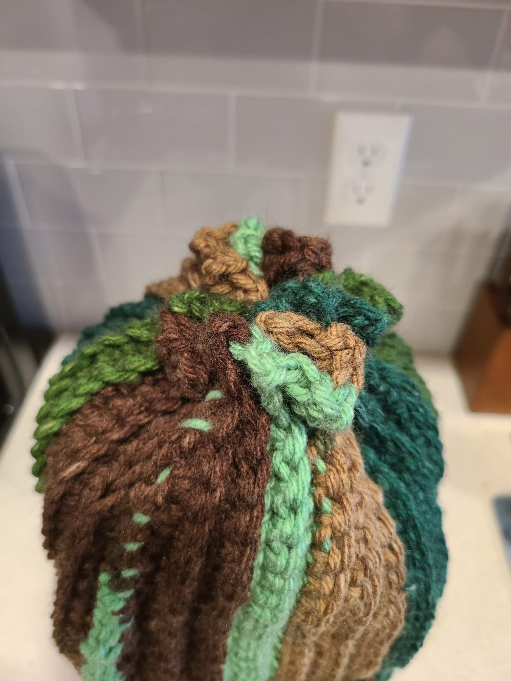 View of top of adult beanie green pattern